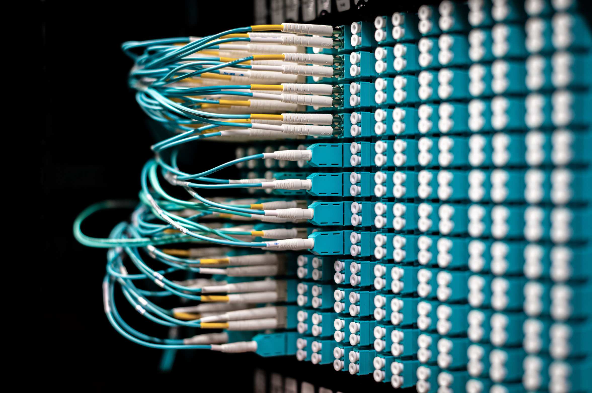 Network switches and server hardware in a rack with ethernet cabling